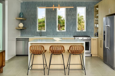 This modern, well-equipped kitchen invites you to gather, create, and savor each moment.