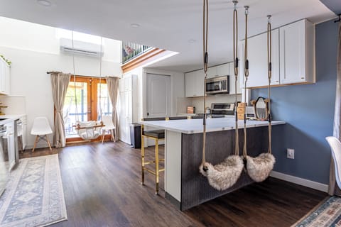 Luxury kitchen with whimsical swings and a baby swing for your tot.