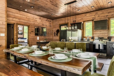 Open floor plan with spacious dining area and well stocked kitchen