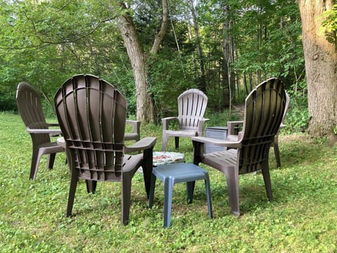 Enjoy an evening near the stream and propane firepit