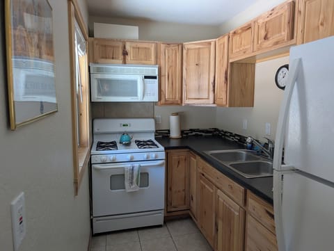 Gas range and oven, microwave over range. 