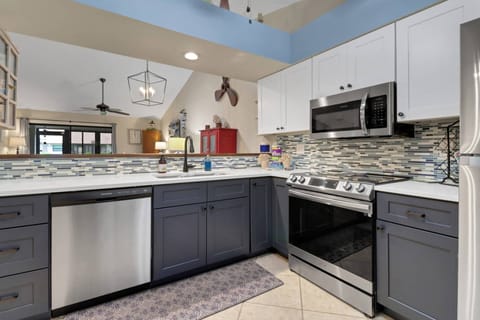 The kitchen has been freshley remodeled and has full-size, updated stainless steel appliances.