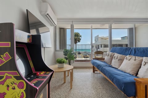 Unwind in our stylish living room with direct balcony access and refreshing views. Your perfect escape.