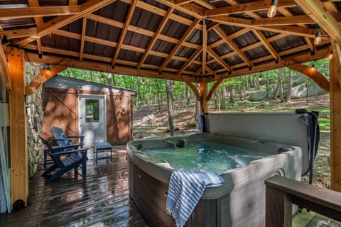 Soak under the stars in the private hot tub—perfect for relaxing evenings.