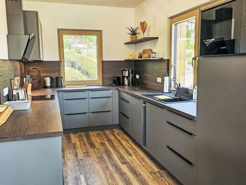 Kitchen, Countertop, Kitchen Appliance, Flooring, Wood, Cabinetry, Furniture, Interior Design, Major Appliance, Home Appliance