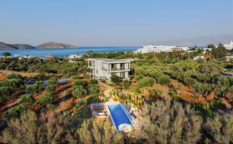 Soak in sublime warmth while Elounda’s coastline.