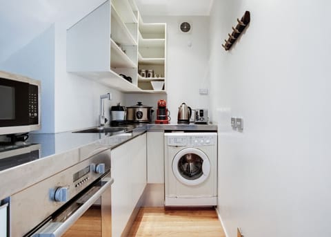 The microwave, second oven, washing machine and other appliances are in the Butlers Pantry.