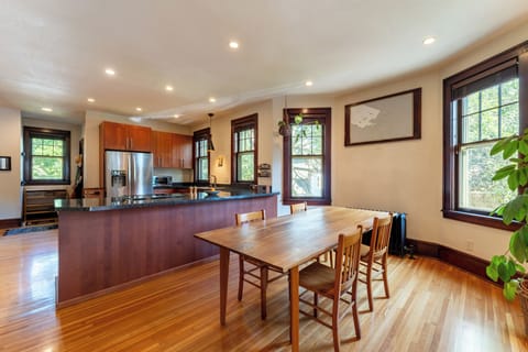 Open plan kitchen, dining and living room. 
Dining table seats 8 comfortably. 