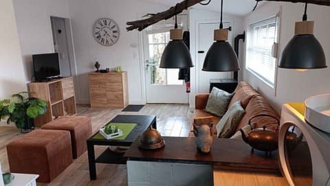 Living room of Holiday Park Klein Strand - Luxury Wooden Chalet