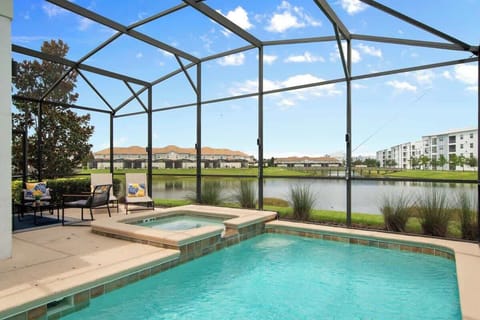 Experience ultimate relaxation with a refreshing swim, outdoor dining, and a BBQ grill, all steps from your living room in this private screened-in pool retreat.