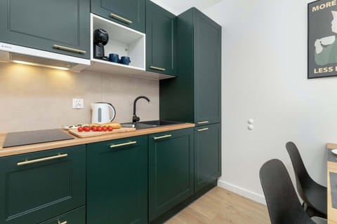 The fully equipped kitchenette includes everything you need for a home-cooked meal.