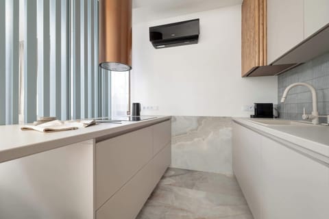 The fully equipped kitchenette includes everything you need for a home-cooked meal.