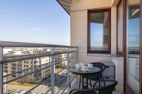 The balcony's peaceful ambiance is ideal for unwinding.