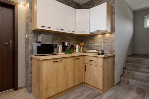 Shared kitchenette situated in the common area.