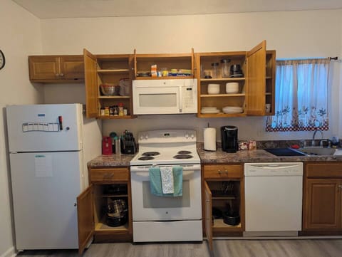 Fully stocked with dining and cooking basics.