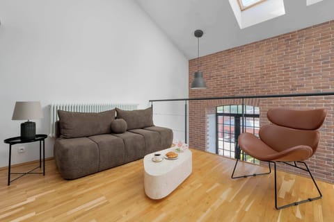 A modern interior with a seating area providing a place to relax.