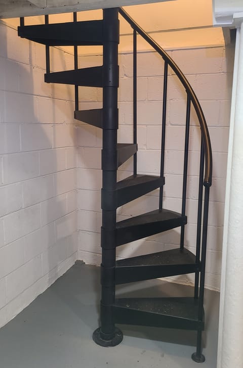 Spiral staircase between upper/lower level. Read details in rental agreement