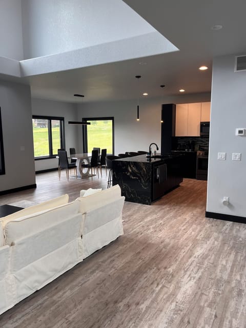 Open roomy area with kitchen and dining area