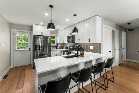 Beautifully updated kitchen with bar seating