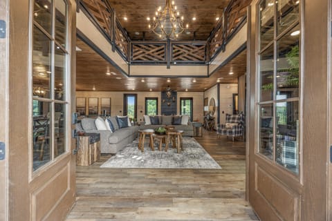 This warm and inviting living space offers plenty of room to gather, connect, and create lasting memories. From game nights to quiet mornings, it’s a space designed for comfort and togetherness.