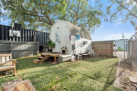 Charming and welcoming exterior with a cozy vibe, perfect for a relaxing stay.