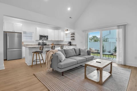 Spacious Living Area with Kitchen and Easy Outdoor Access