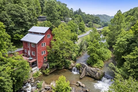 Situated along 950 feet of Cane Creek, enjoy your own private waterfall and access to the river.