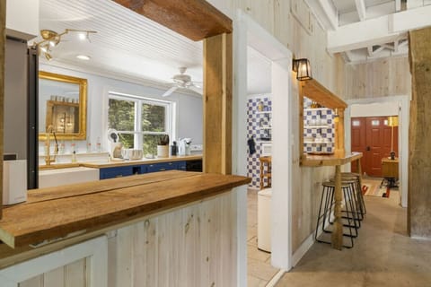 Windows into the kitchen make this space great for hosting.