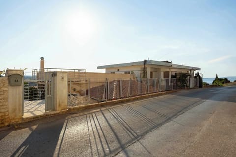 Traditional Entrance from Quiet Village Road
The property is accessed directly from a peaceful residential street, offering easy arrival with nearby street parking.