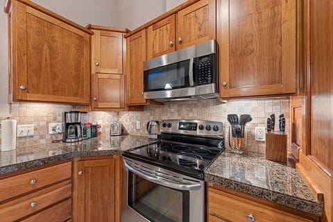 Beautiful kitchen stocked with everything you will need to cook in