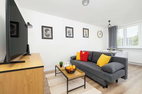 Enjoy your favorite shows on the flat-screen television in the elegant living area.