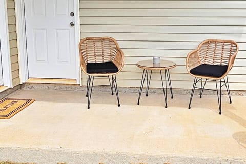 It is located right off the main room in the back. Perfect for 2 to enjoy at sunset or sunrise. Fenced-in backyard for privacy.