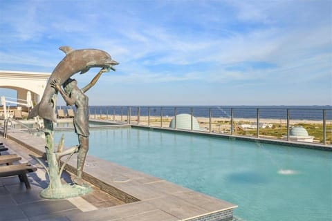 Enjoy the heated pool with views of the beach.