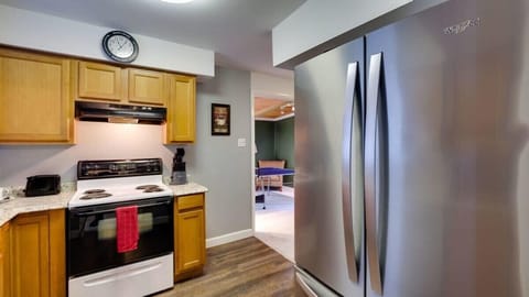 Kitchen with a full-size refrigerator to keep your groceries fresh.