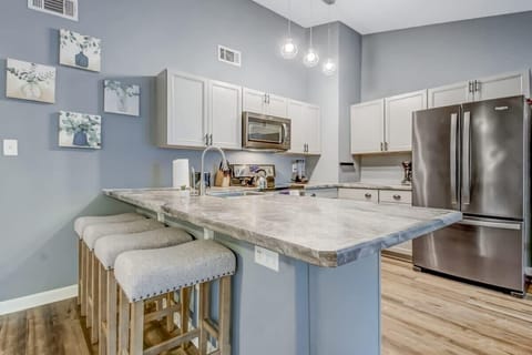 Breakfast bar seating allows you to enjoy meals and chat while cooking.