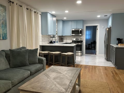 Living & kitchen area with smart TV