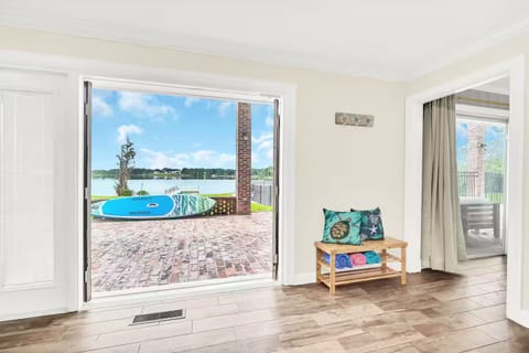 Doors open right to the expansive covered patio for easy indoor-outdoor living