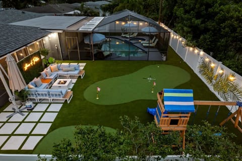 And just when you thought the fun couldn’t get any better—step into our expansive backyard! From patio lounging to mini putt-putt showdowns and a full kids’ playground, there’s something for everyone to enjoy.