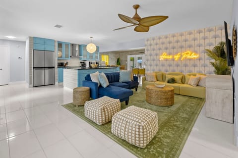 Where everyone can be together—our open floor plan seamlessly connects the living room and kitchen, so no one ever misses a moment (or a snack!).