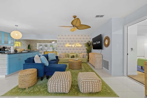 Where everyone can be together—our open floor plan seamlessly connects the living room and kitchen, so no one ever misses a moment (or a snack!).