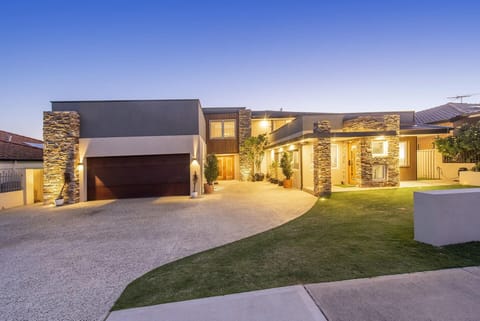 Welcome to your private paradise! Our meticulously cared for and expansive backyard creates a truly special outdoor haven. With lush landscaping and plenty of room to roam. 