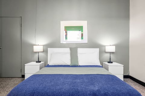 Tranquil bedroom with a comfortable bed for a peaceful escape.

