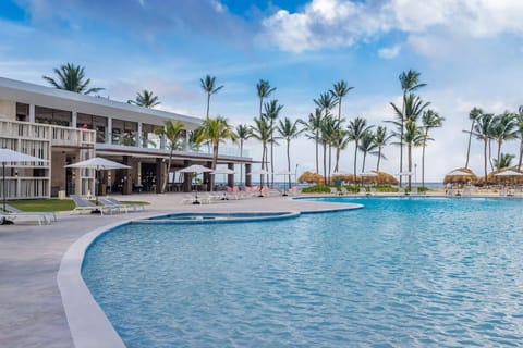 Stretch out poolside and savor endless sea views.