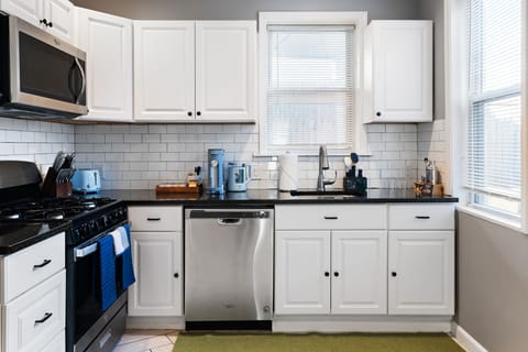 Modern appliances and ample storage for our kitchen