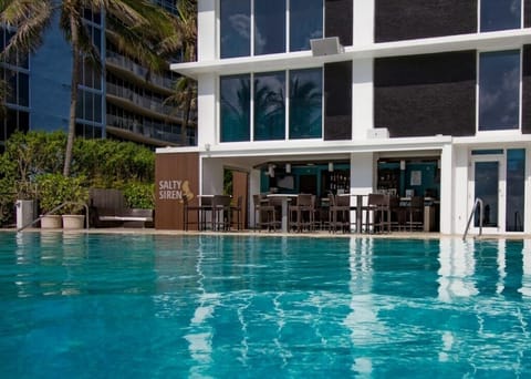 Sip cocktails at the pool bar after a swim.