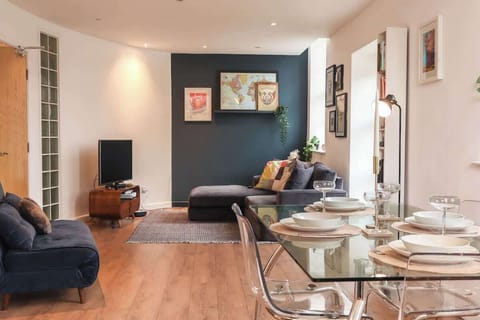 The dining area is a designated space for enjoying meals, typically furnished with a table and seating.
