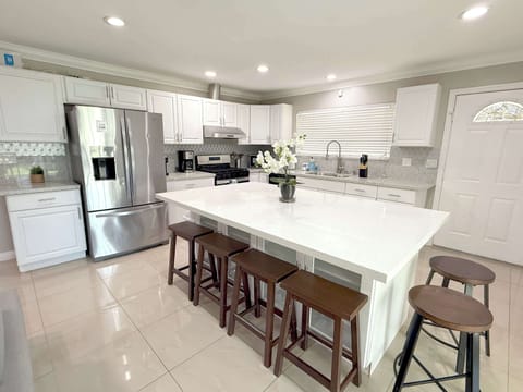 Full kitchen with all the cooking utensils 