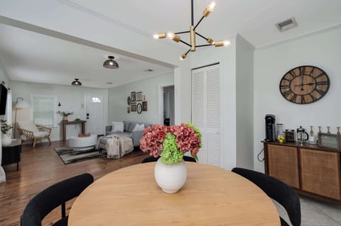 Enjoy meals and good company in our stylish dining area, conveniently located adjacent to the comfortable living room for seamless entertaining.