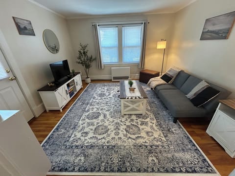 Futon couch, smart TV, black out curtains,  heating and AC in summer