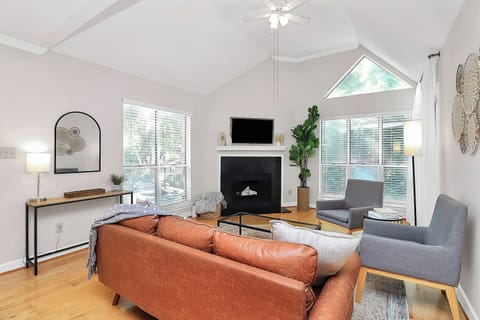 Bright and spacious living room with vaulted ceilings - perfect for relaxing!